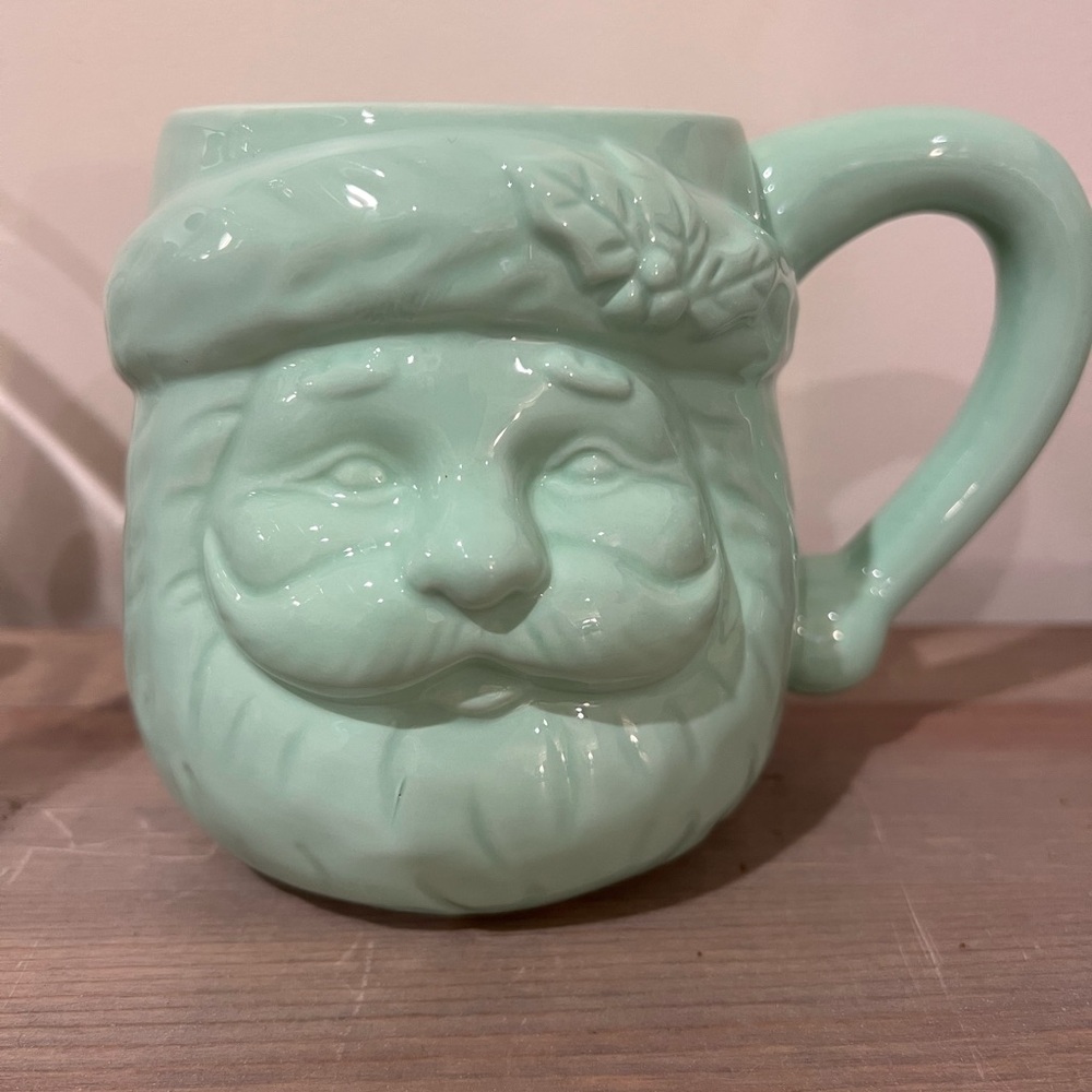 Vintage 2002 Santa Coffee mug. Mint Green in color. Holds 20oz.